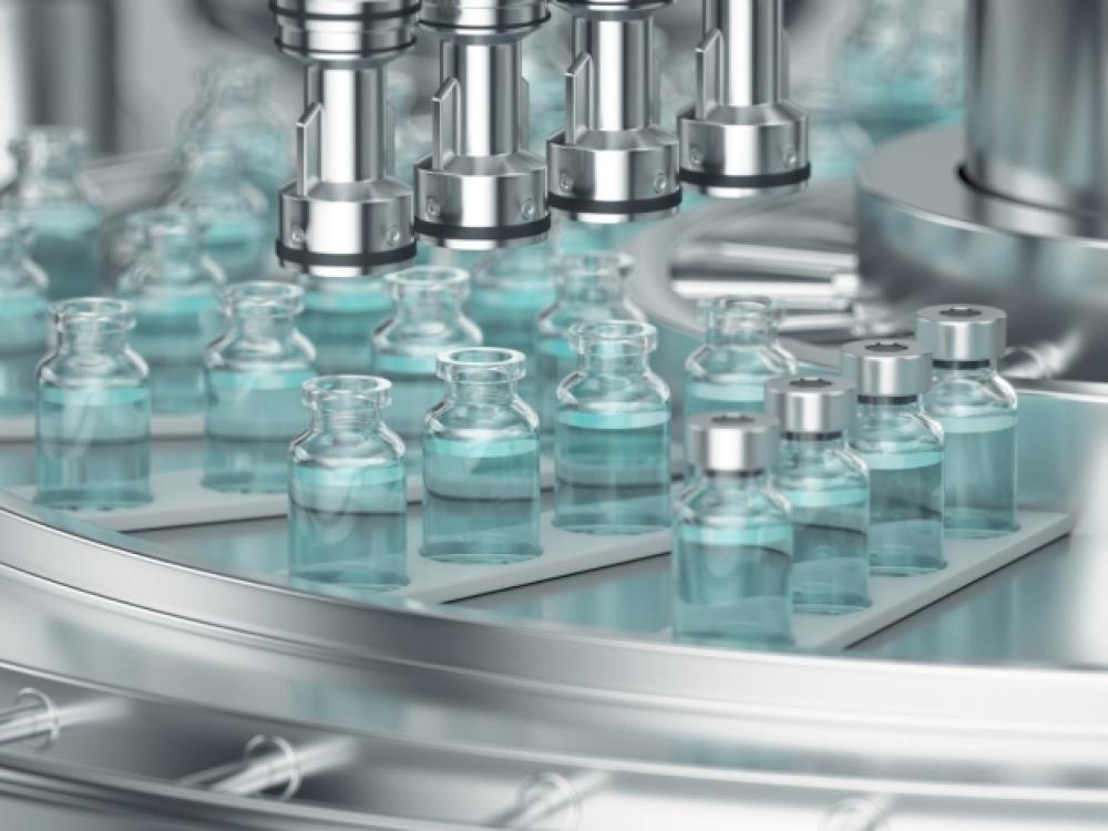 "Researchers Develop Tool to Identify Existing Drugs to Use in a Future Outbreak; stock image of viles being filled; photo credit: wacomka/Getty Images"