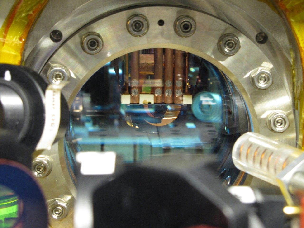 "Scientists Have Full State of a Quantum Liquid Down Cold; An atom chip, in a laboratory at TU Wien (Vienna), created by physicists in order to trap ultra-cold atoms and study the properties of quantum systems. Image credit: Thomas Schweigler."