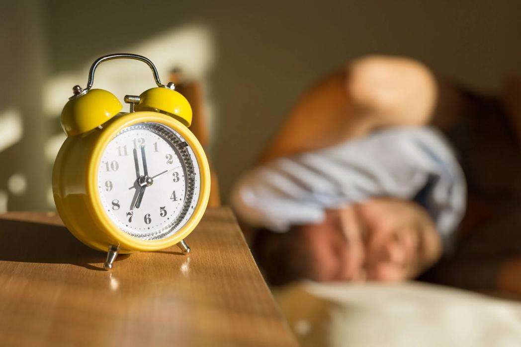"Lack of sleep will catch up to you in more ways than one; stock photo of alarm clock"