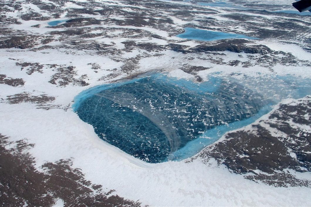 Ice Sheet Surface Melt Is Accelerating In Greenland and Slowing In Antarctica