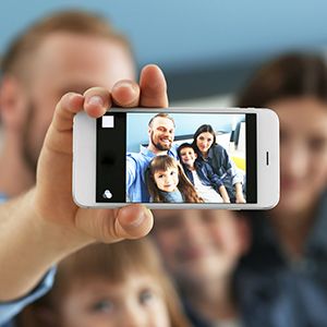 family taking selfie