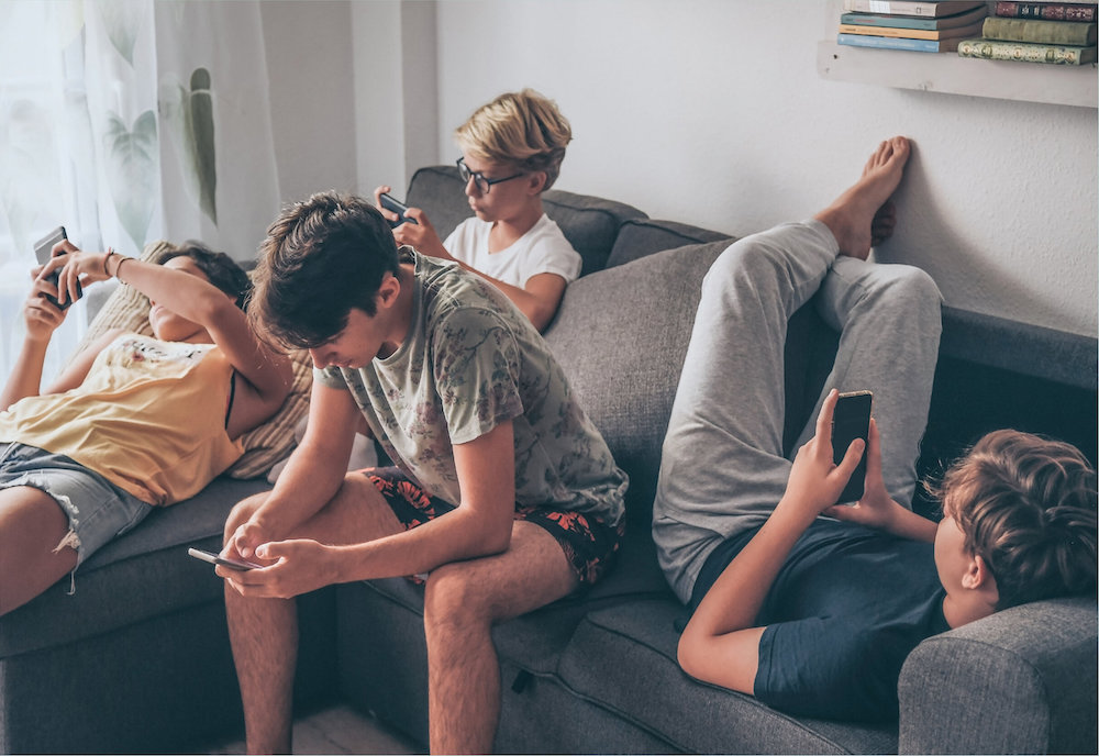 Kids using smartphones
