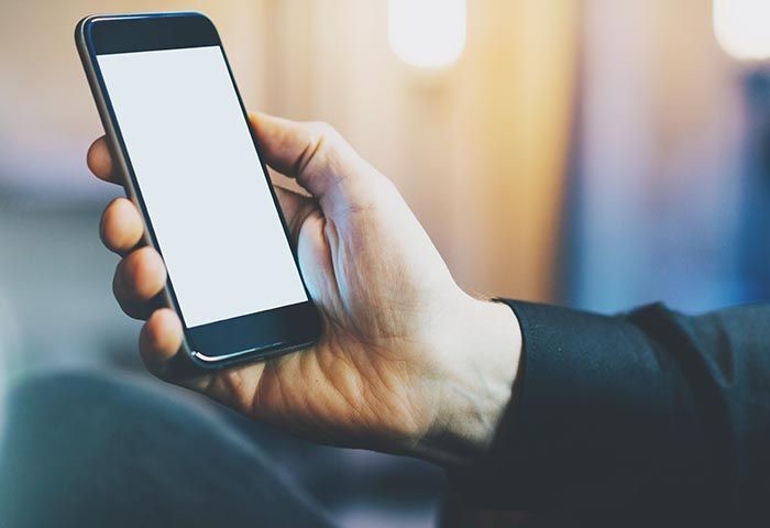 Photo of smartphone in hand
