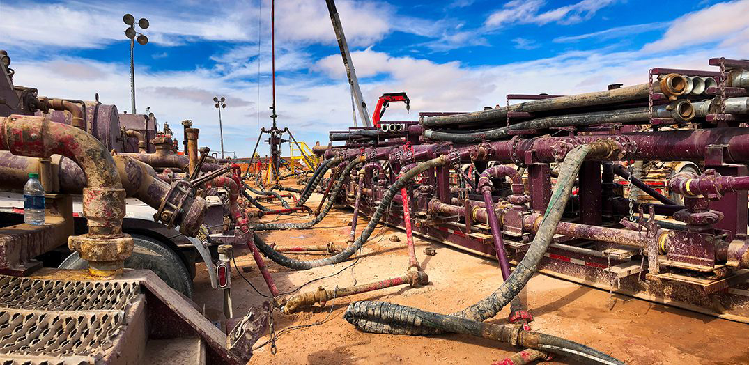 Image: Well head connected to fracking pumps