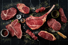 Image of various different beef steaks on a table
