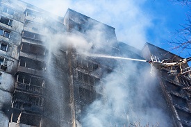 Extinguishing a fire in a multi-storey building after shelling by the Russian army