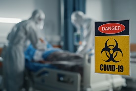 pateint being treated for COVID-19 in a hospital setting