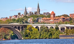 A view of the Key Bridge, the Potomac, and the Georgetown University campus