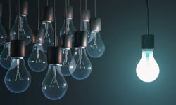 hanging lightbulbs and only one is lit