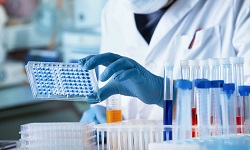 someone handling samples in a laboratory
