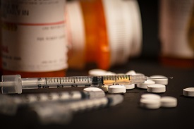 Loaded syringe and prescription opioids