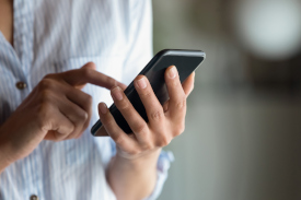 a woman using her smartphone