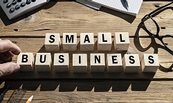 Wooden blocks spell out Small Business