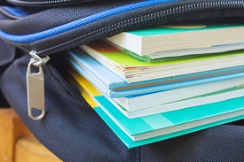 Textbooks inside a bookbag