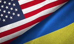 Flags of the United States and Ukraine laid next to each other diagonally