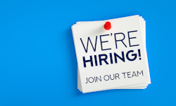 A sign that says We're Hiring!