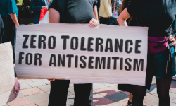 Protest sign that says Zero Tolerance For Antisemitism