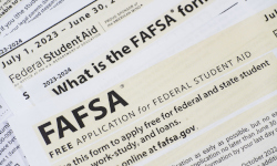 Black and white FAFSA application papers spread out