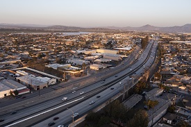 a highway cutting through a city