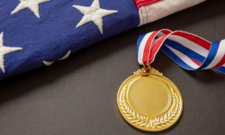 US Flag next to medal
