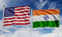 the flags of the United States & India fying next to each other