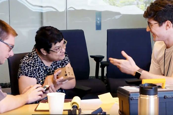 Image: Christopher Laine and Brian Cohn work with people with cerebral palsy.