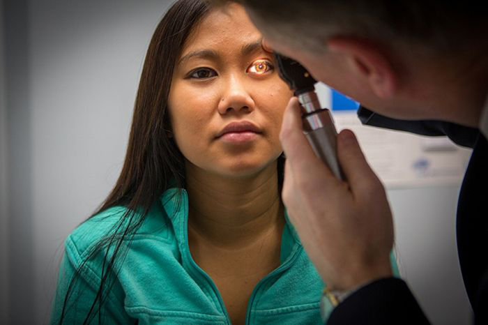 John J. Leddy, director of the UB Concussion Management Clinic at UBMD Orthopaedics and Sports Medicine, examines an adolescent concussion patient.