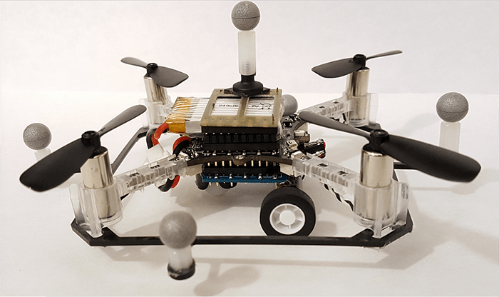 One of the researchers' quadcopter drones with wheels