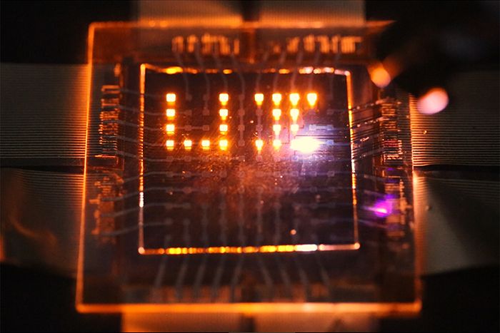 A laser stylus writes on a small array of multifunction pixels made by dual-function LEDs than can both emit and respond to light.
