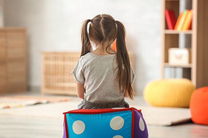Child sitting quietly