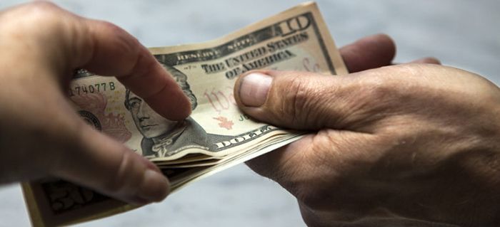 Photo: Money changing hands