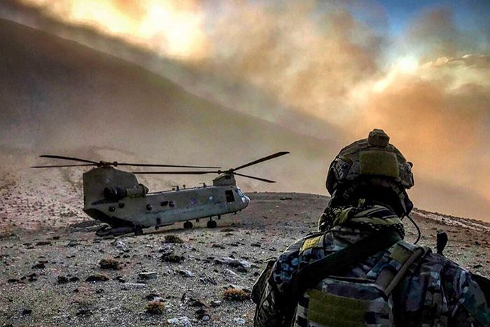 Soldier near helicopter
