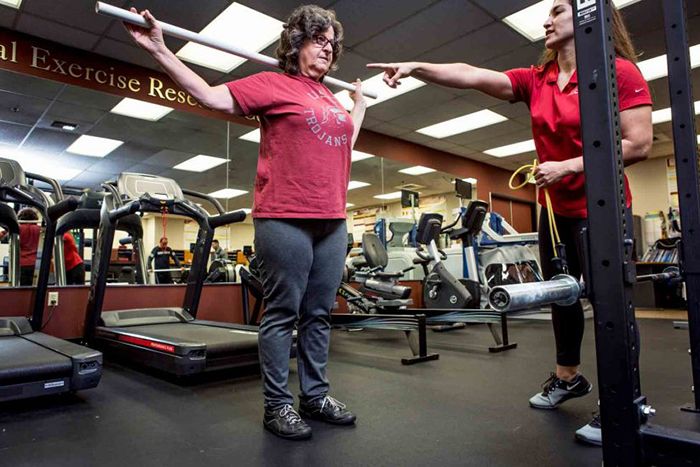 Carla Sanchez works out with Christina Dieli-Conwright.