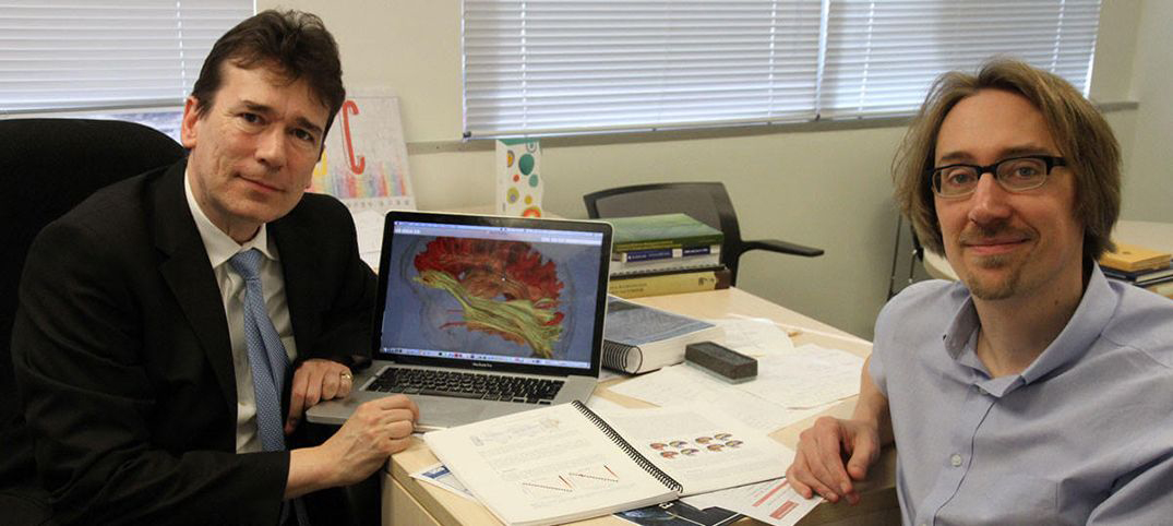 Neuroscientist Paul Thompson (left) with computer scientist Greg Ver Steeg.