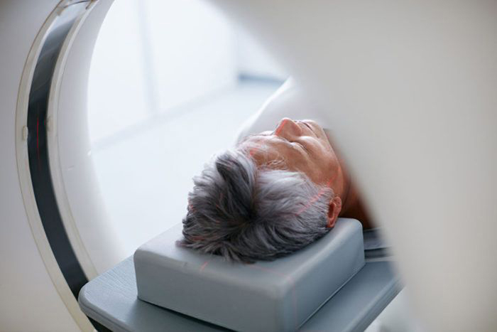 Man receiving MRI scan
