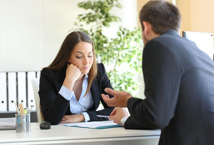 Image: Two workers having a conversation