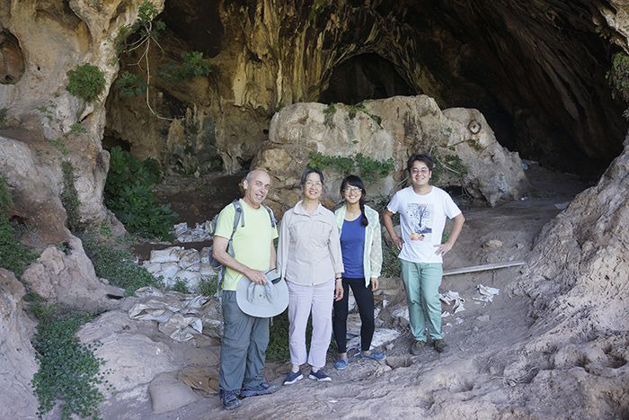 Researchers in front of Raqefet Cave.