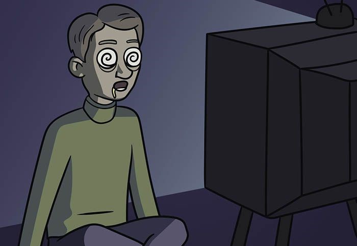 Image of young man watching TV