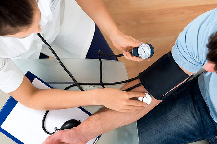 Taking blood pressure