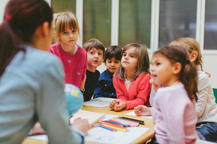 Photo: Children and teacher in classroom