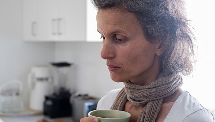 Older woman drinking coffee