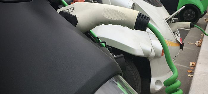 Image: Electric cars charging their batteries.