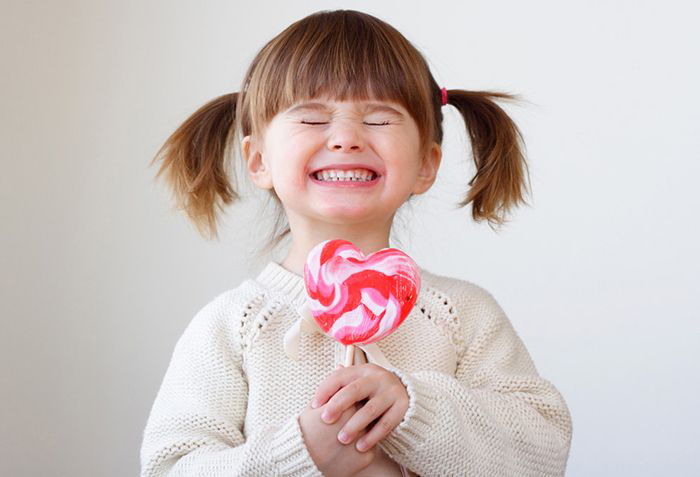 Young child with lollipop