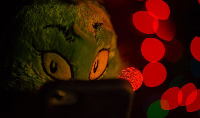 Image: Grinch using smartphone