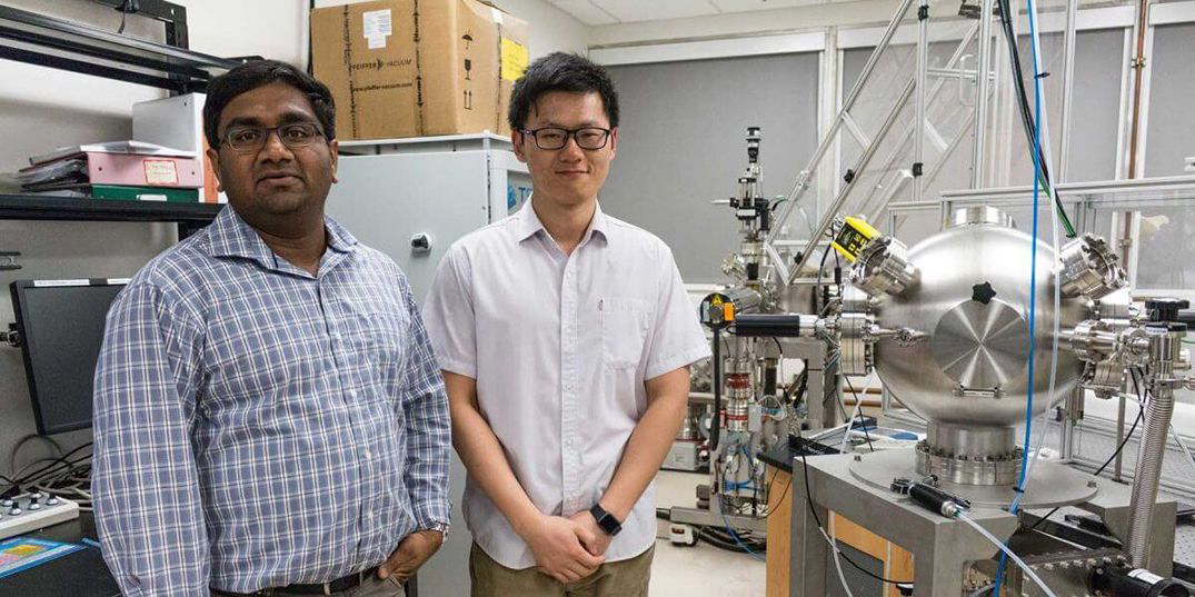 Professor Jayakanth Ravichandran and PhD student Shanyuan Niu in the lab