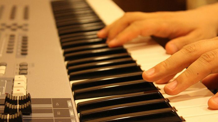 Image: hands on a keyboard