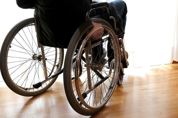 Photo of man in wheelchair