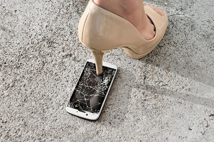 Woman accidentally stepping on iPhone