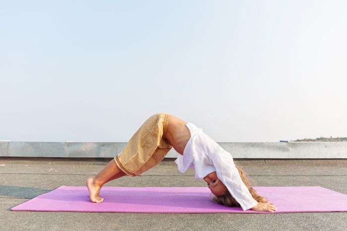 Child doing yoga