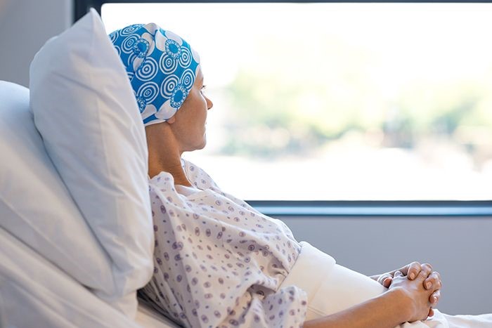 Photo of cancer patient in hospital bed